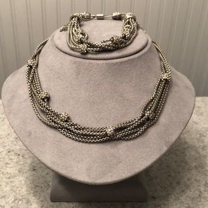 Multi strand silver necklace and bracelet